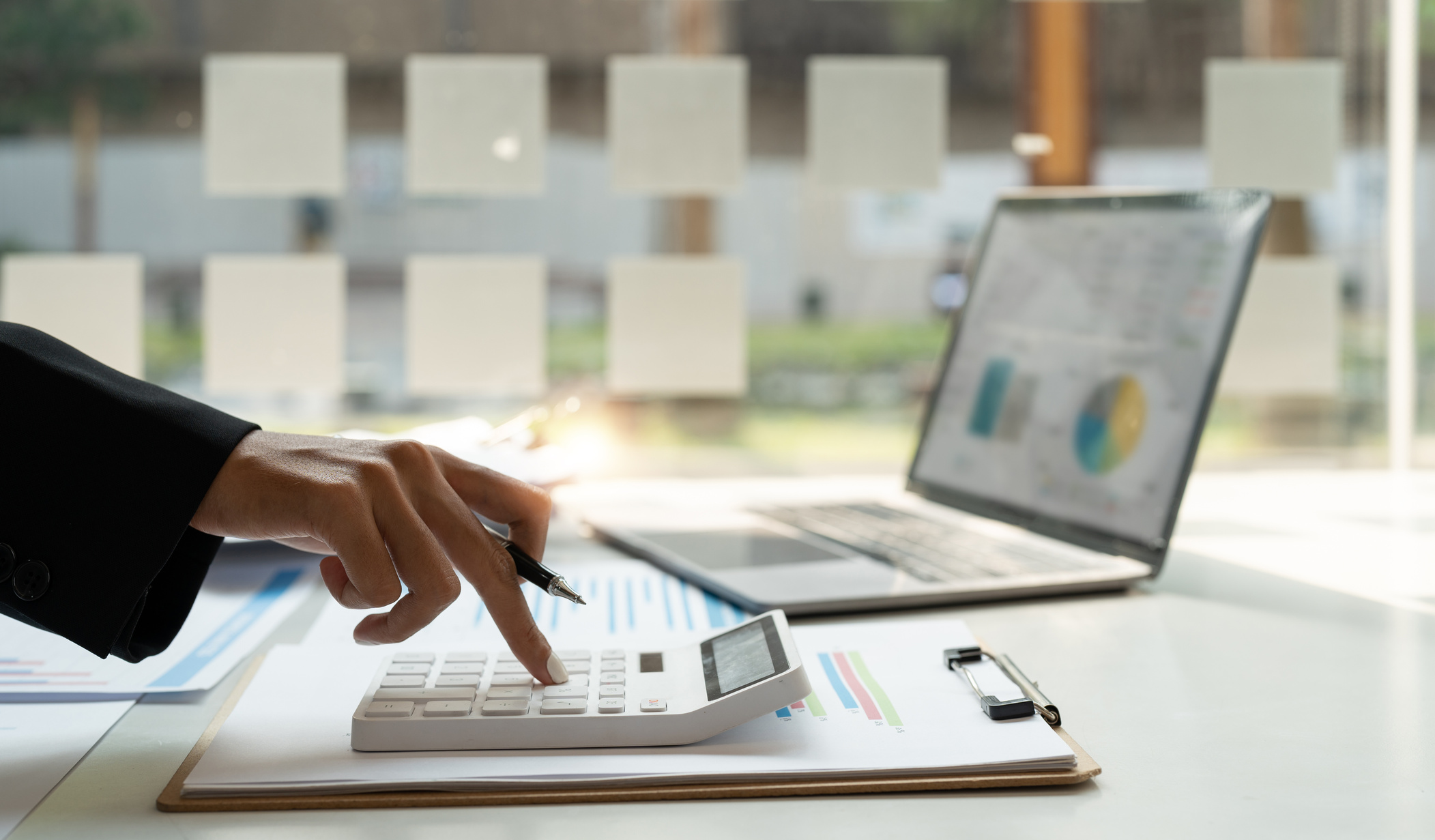 bookkeeper or financial inspector hands making report, calcu